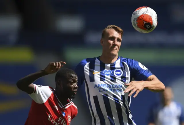 Arsenal's Nicolas Pepe and Brighton's Dan Burns