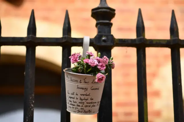 Flowers and message left at stabbing scene