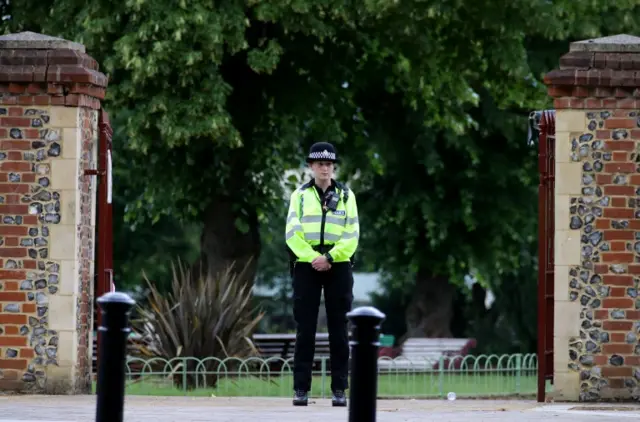 Police guard an entrance to Forbury Gardens on June 21