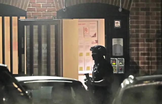 Police outside flats in Reading