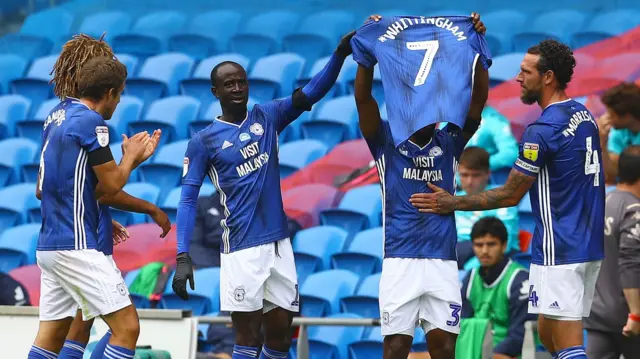 Junior Hoilett with Peter Whittingham shirt