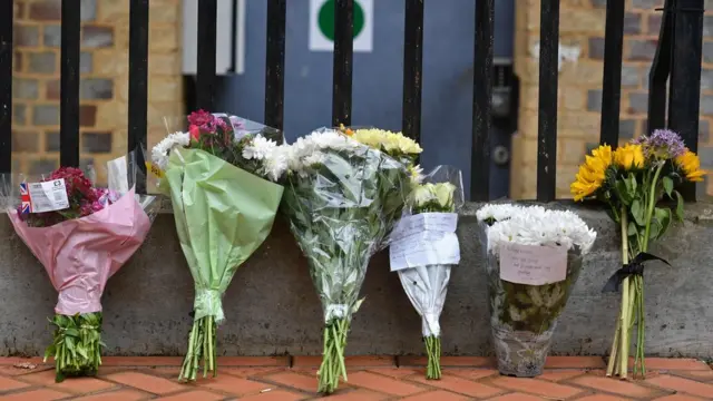 Flowers at the terror scene in Reading