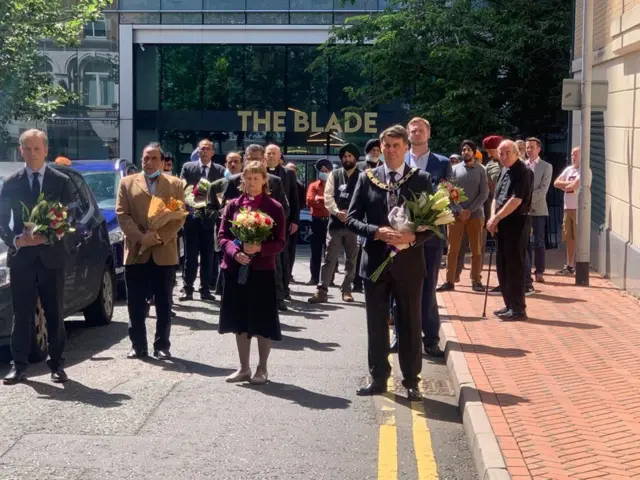 Leaders lay flowers in Reading following Saturday's attack