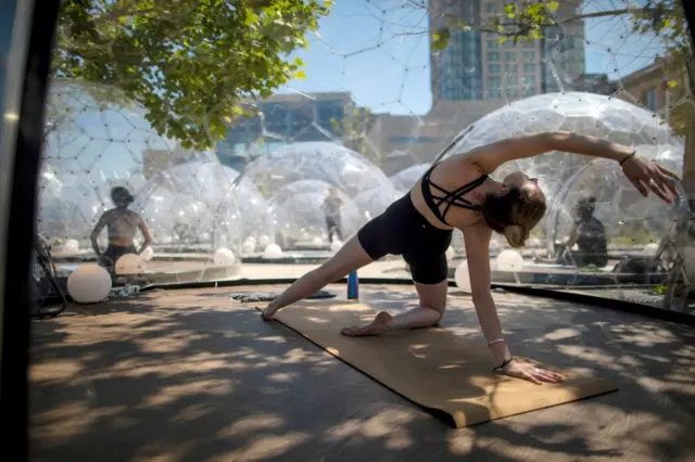 Outdoor yoga class by LMNTS Outdoor Studio in Toronto, Canada, on 21 June 2020