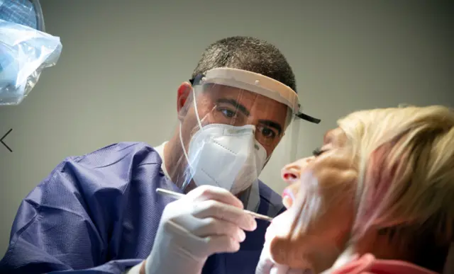 A dentist at work