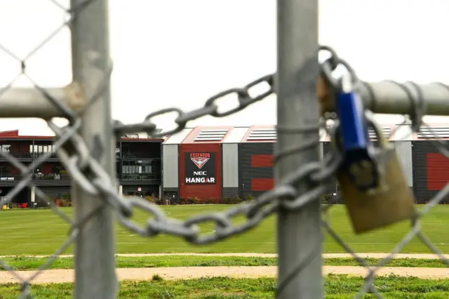 A padlock seals a gate at AFL club Essendon's training oval in Melbourne