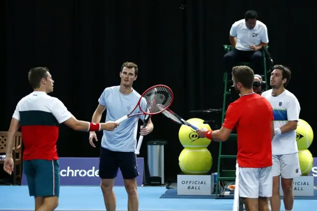 Liam Broady and Cameron Norrie touch racquets with Jamie Murray and Neal Skupski