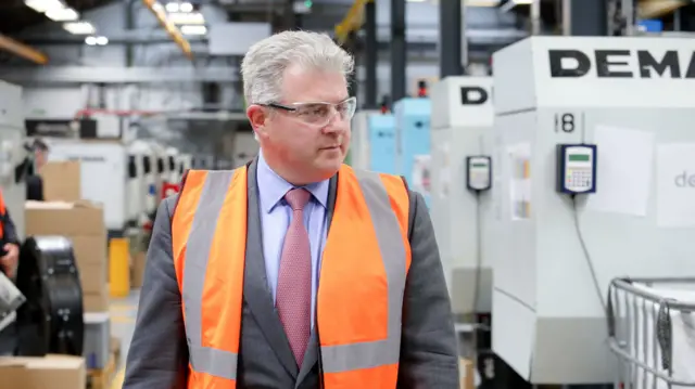 Brandon Lewis during a visit to Denroy Plastics in Bangor, one of the companies involved in creating HeroShield protective visors for key workers