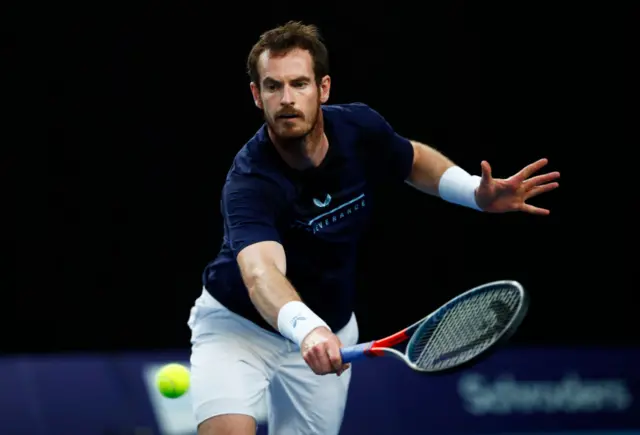 Andy Murray plays a backhand