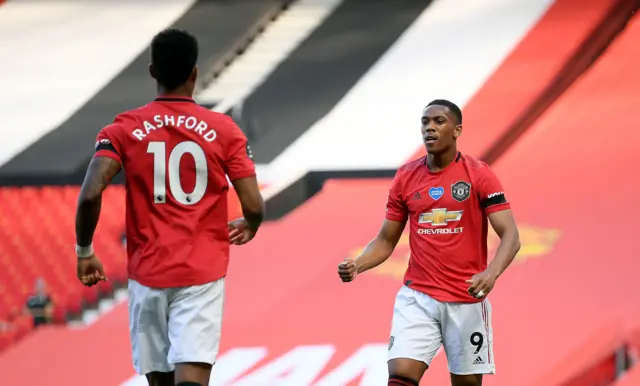 Anthony Martial celebrates with Marcus Rashford