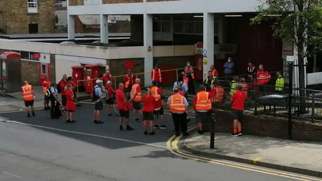 Staff outside the office