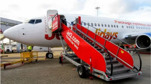 A Jet2 flight on the tarmac at an airport