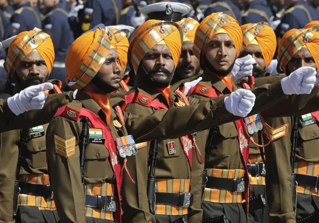 Indian servicemen march in formation