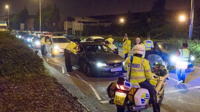 Cars being stopped by police