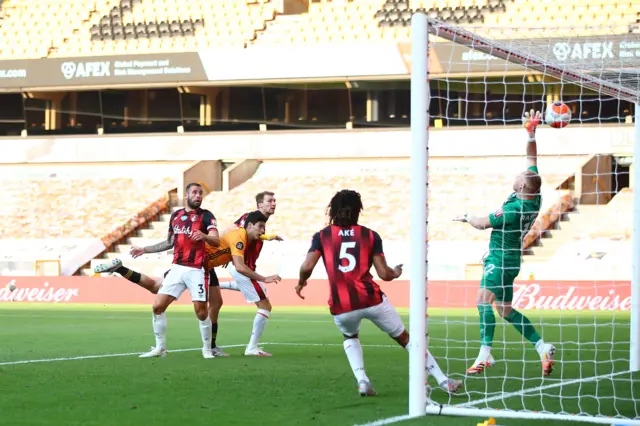 Raul Jimenez heads home