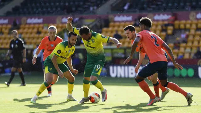 Josip Drmic (C) of Norwich in action during the English Premier League soccer match between Norwich City and Everton FC