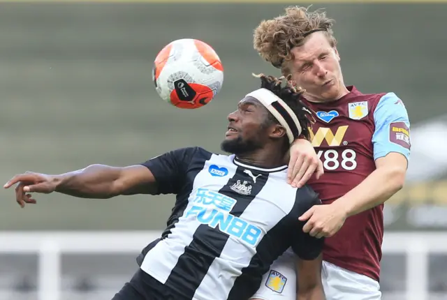 Allan Saint-Maximin in action with Matt Targett