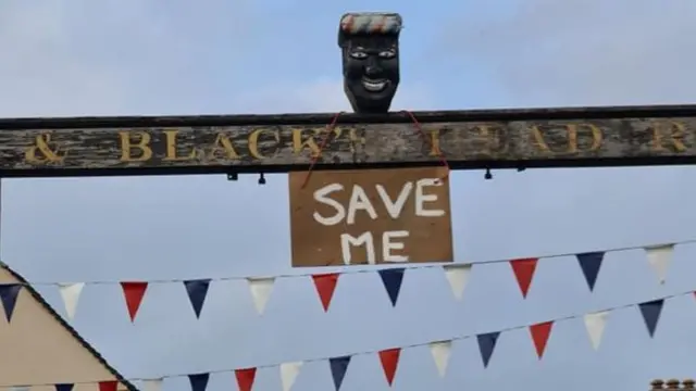 Green Man and Black’s Head sign