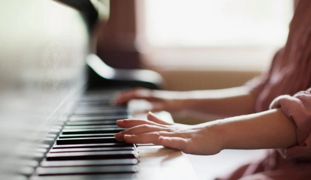 child playing piano