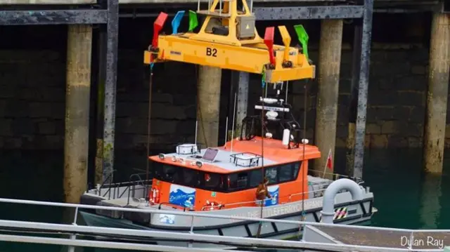 Little Ferry being lifted out of the water
