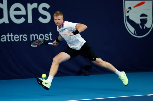 Kyle Edmund hits a forehand