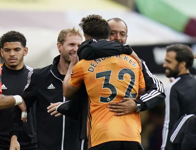 Wolverhampton Wanderers manager Nuno Espirito Santo celebrates with Leander Dendoncker after the match