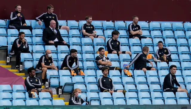 Wolves substitutes sit in the stands