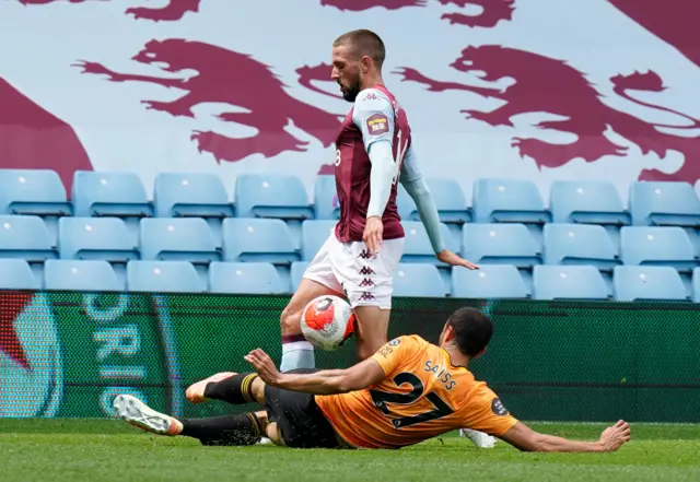 Aston Villa's Conor Hourihan in action with Wolverhampton Wanderers' Romain Saiss