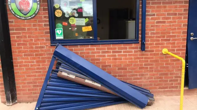 Window shutter ripped down