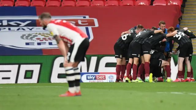 Northampton Town players celebrate