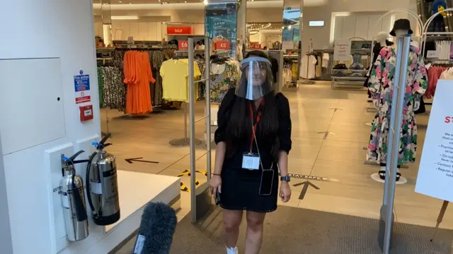 Natalie Dimilta from the H&M store was happy to be back at work.