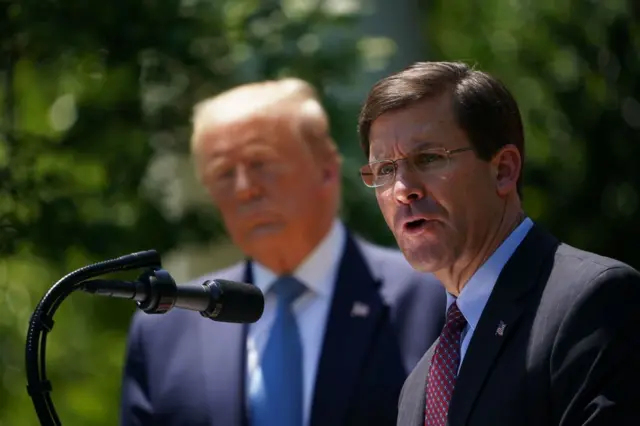 US Defense Secretary Mark Esper, with US President Donald Trump, speaks on vaccine development on May 15, 2020