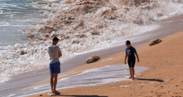 Two people on a beach