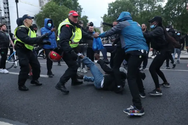 Protestors and police officers during a Black Lives Matter protest rally in Parliament Square, London, in memory of George Floyd who was killed on May 25 while in police custody in the US city of Minneapolis.