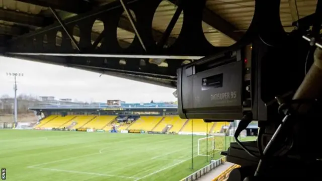 TV camera at football stadium