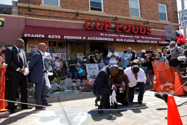 Floyd's son took a knee - a protest gesture - in the street where he father died