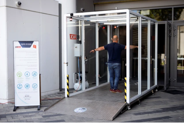 A special tunnel has been installed at Bloomfield Stadium which enables football players arriving for matches to be sprayed with a disinfectant mist