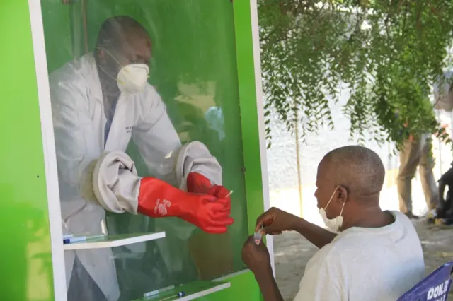 A patient is tested for coronavirus in Nigeria