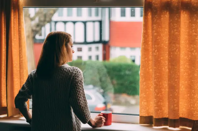 woman at window