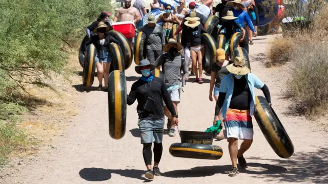 People go tubing on Salt River during the outbreak