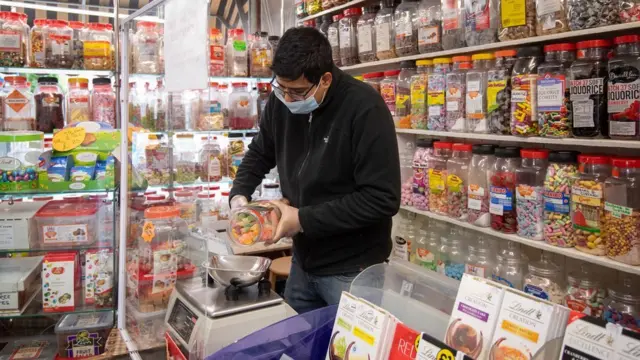 Man in sweet shop