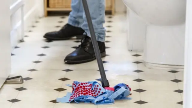 cleaner mopping floor