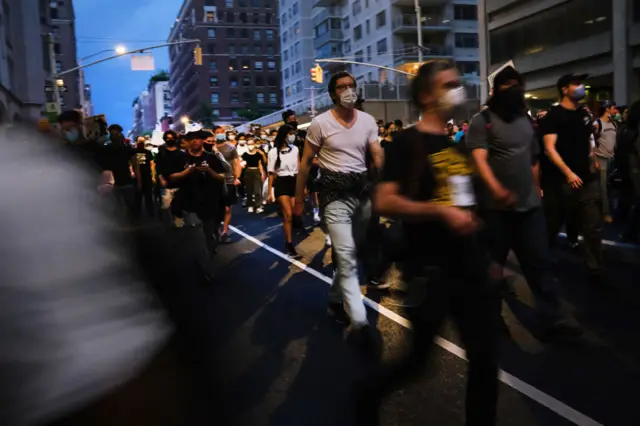 Protesters march in Manhattan over the killing of George Floyd by a Minneapolis Police officer on June 03, 2020 in New York City