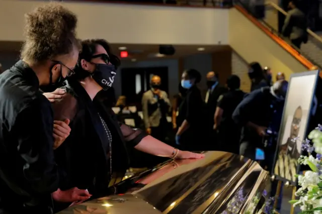 George Floyd"s girlfriend, pays respect during a memorial service