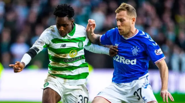 Celtic's Jeremy Frimpong and Rangers' Scott Arfield