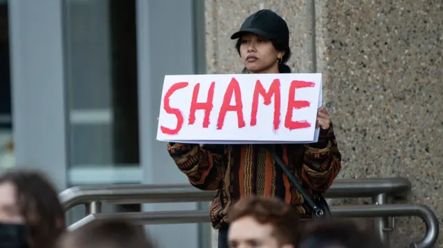 Protesters outside the court room in Sydney