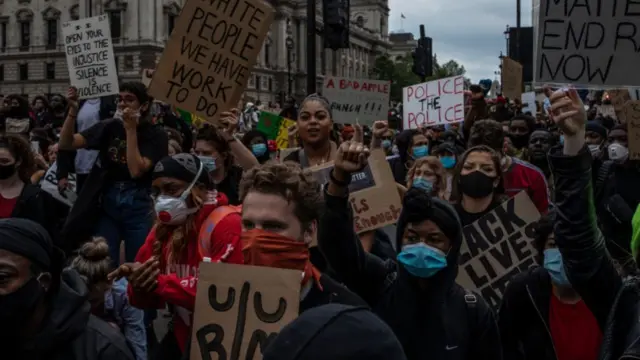 Demonstrators gather in Whitehall towards the end of a Black Lives Matter protest on 3 June