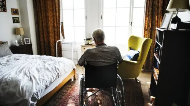 Man in care home setting