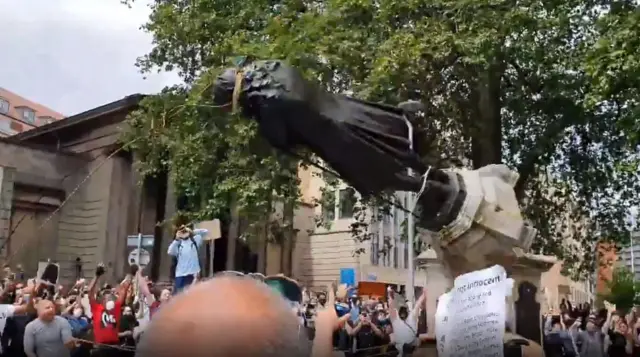 Protesters tear down Edward Colston statue in Bristol