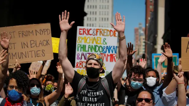 Current and former New York City Mayor"s staff gather to call for reforms during a protest against racial inequality in the aftermath of the death in Minneapolis police custody of George Floyd, in New York City, New York, U.S. June 8